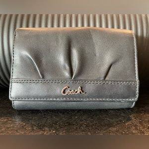 Coach black leather wallet.